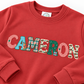 Boys’ Personalized Christmas Name Sweatshirt — Muted Red - Savannah Creations