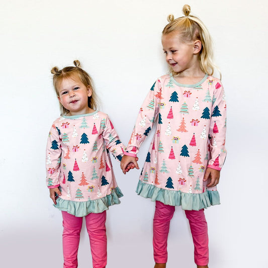 Girls Christmas two piece outfit with festive print tunic and pink leggings