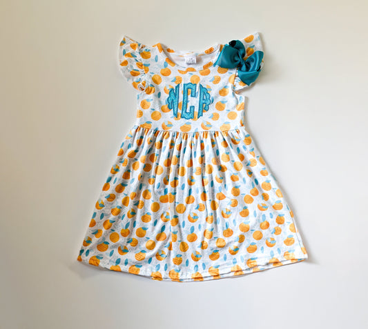Girls Monogrammed Orange Print Dress with Bow: Embroidered Summer Outfit
