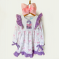 Full view of personalized bow birthday dress on hanger